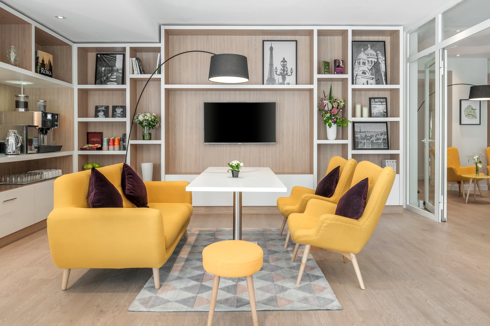 Lounge area of our apart hotel in Paris 18 equipped with a free vending machine of hot drinks