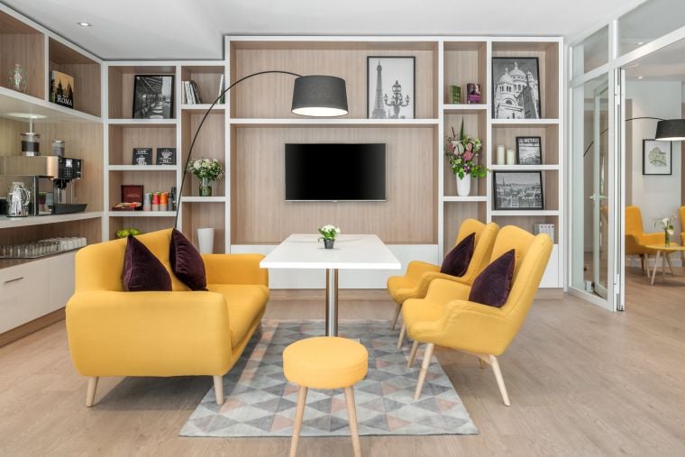 Lounge area of our apart hotel in Paris 18 equipped with a free vending machine of hot drinks