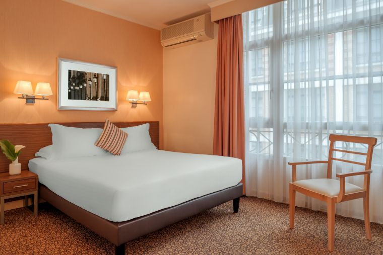 Chambre d'un Appartement 2 pièces équipée d'un lit double, appart hotel Paris 6