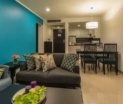 Chic Living & Dining Rooms of a One-Bedroom Apartment at Somerset Vientiane