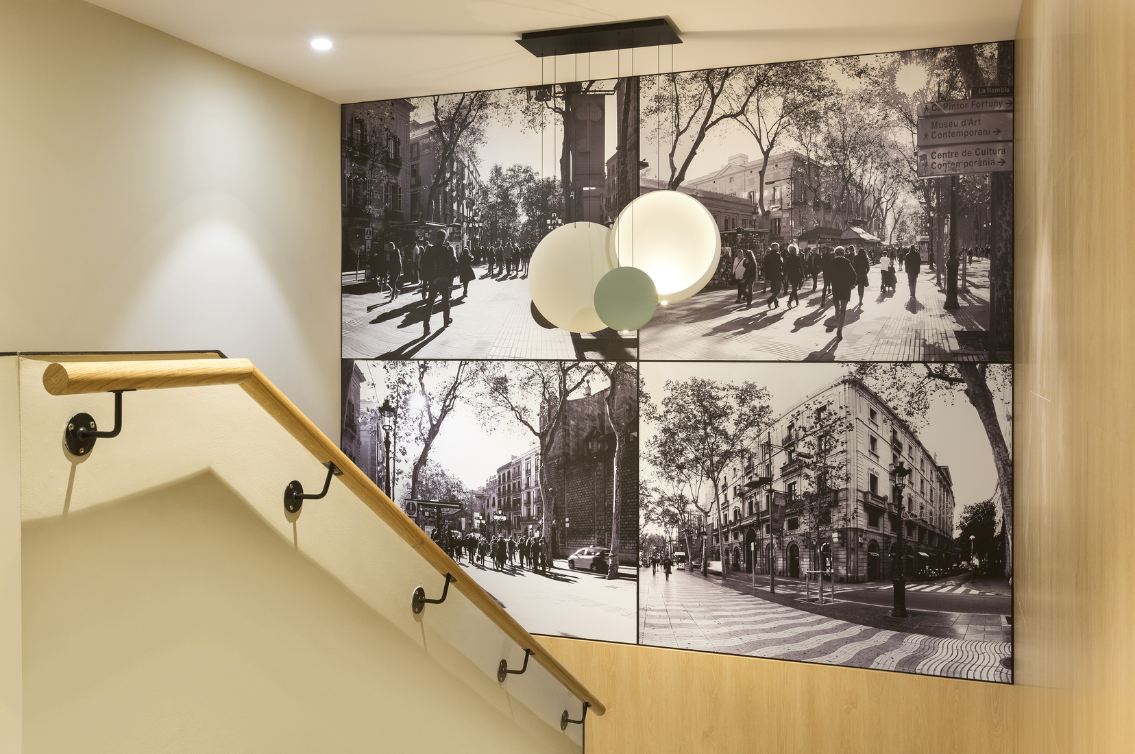Stairs with photographs of Barcelona, apart hotel Barcelona