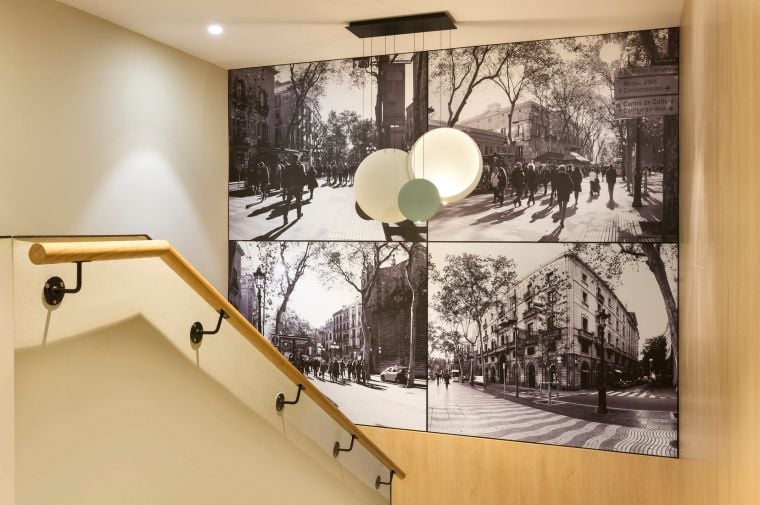 Stairs with photographs of Barcelona, apart hotel Barcelona