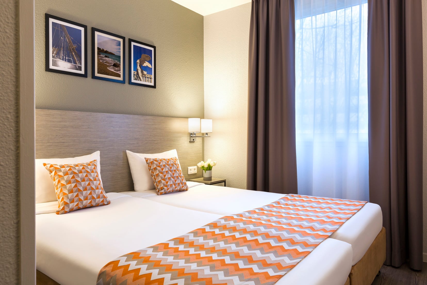 Bedroom of a 1-Bedroom Apartment equipped with 2 single beds, apart hotel Montpellier