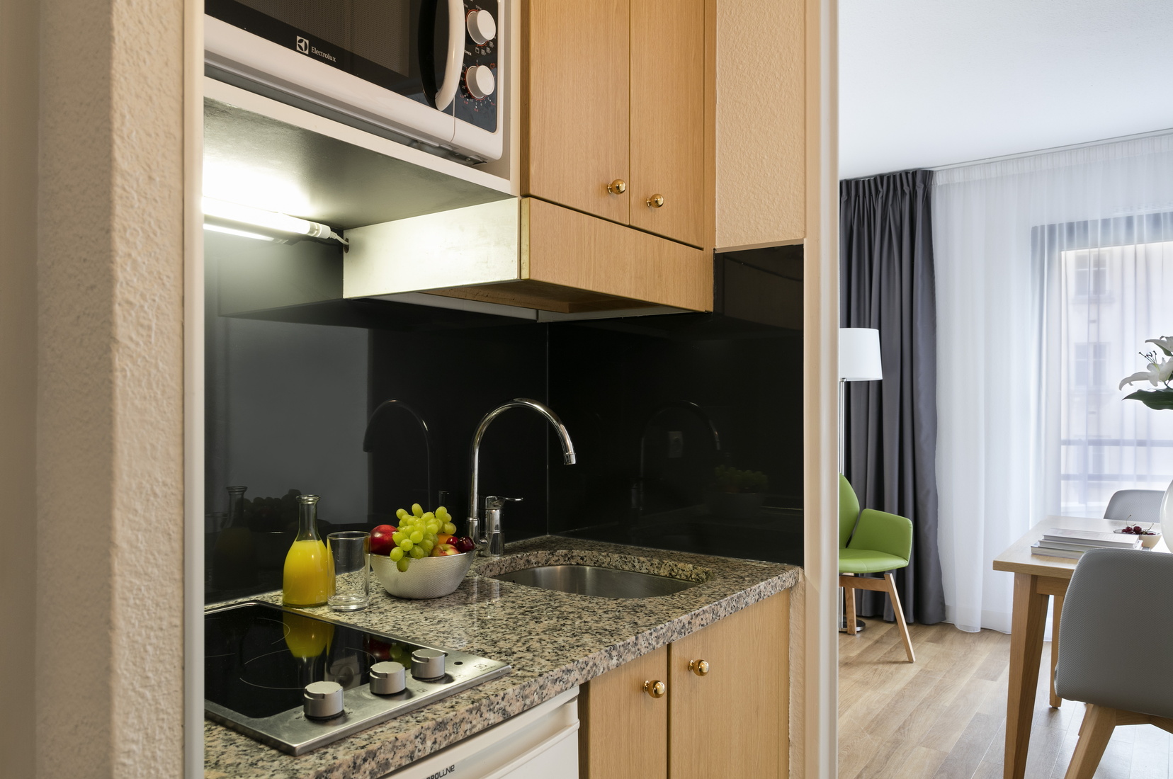Fully equipped kitchen of a Studio, apart hotel Paris 13
