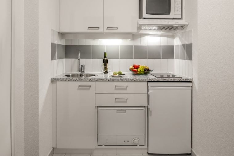 Fully equipped kitchen of a 1-Bedroom Apartment, apart hotel Paris 12