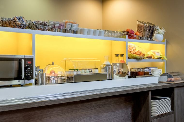 Breakfast room and its continental buffet, apart hotel Paris 14