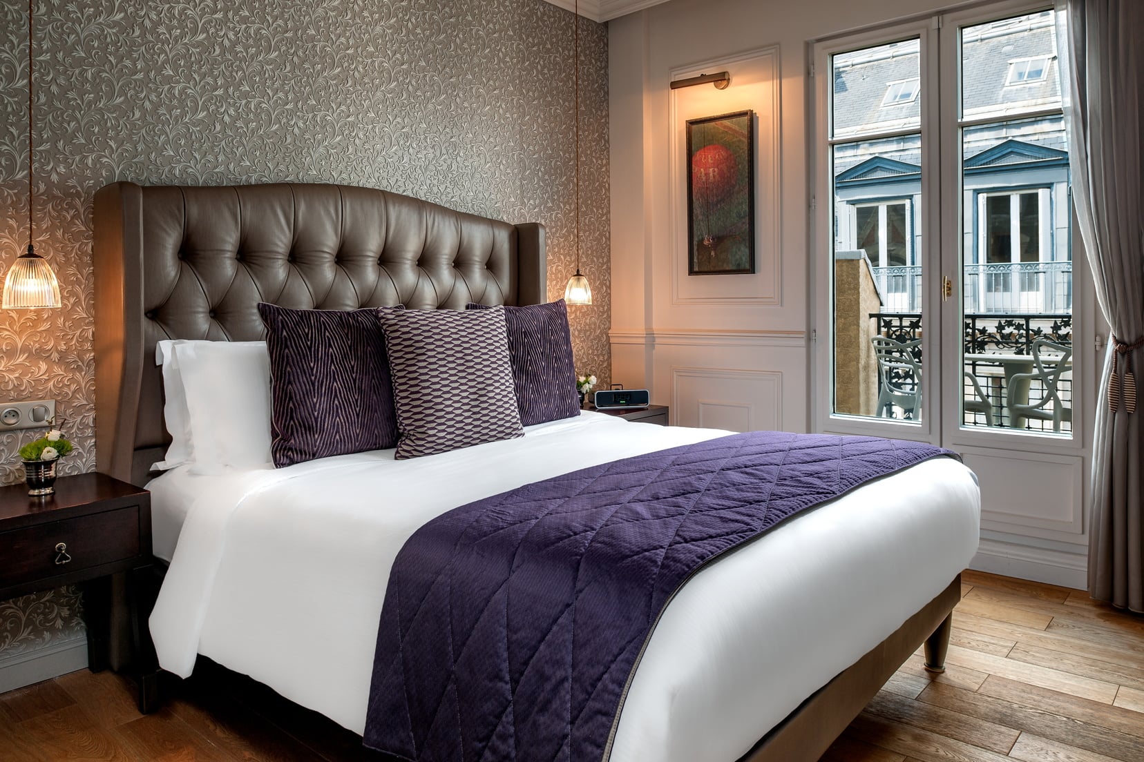 Exclusive Suite and its bedroom equipped with a large double bed, 5 star hotel in Paris 1