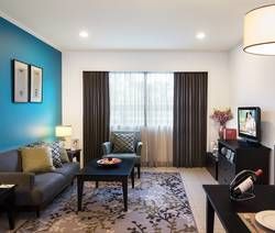 Fully Furnished Living & Dining Rooms of a One-Bedroom Deluxe at Somerset Vientiane