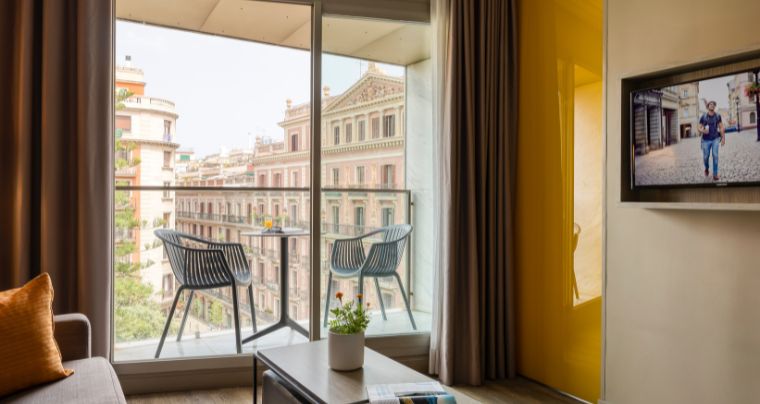 Citadines Las Ramblas Barcelona | One Bedroom Apartment | Living Room 