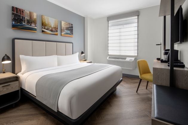 Apartment Types CITADINES CONNECT 5TH AVE NYC GUESTROOM King Bedroom Angle Thumbnail